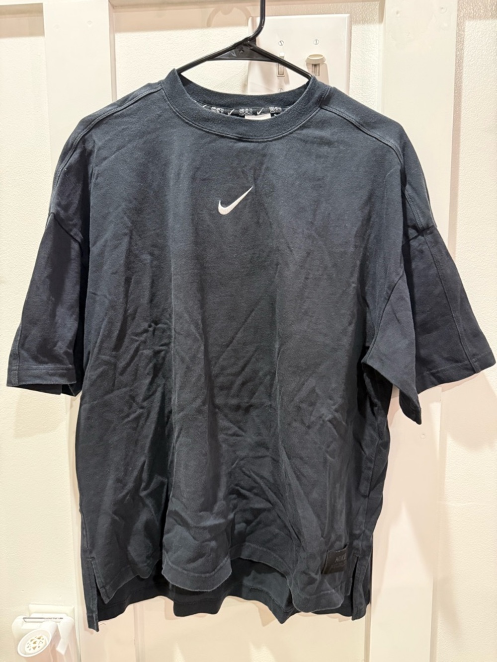Nike Oversized Short-Sleeve Crew Tee in Charcoal Black with White Swoosh